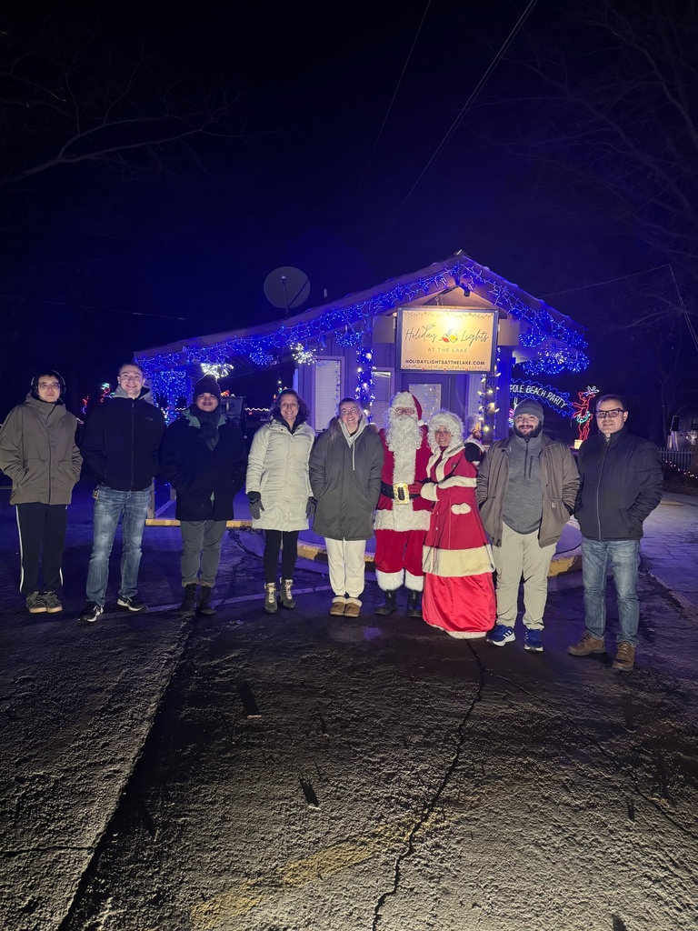 Spies Lab members group photo with Mr. and Mrs. Claus